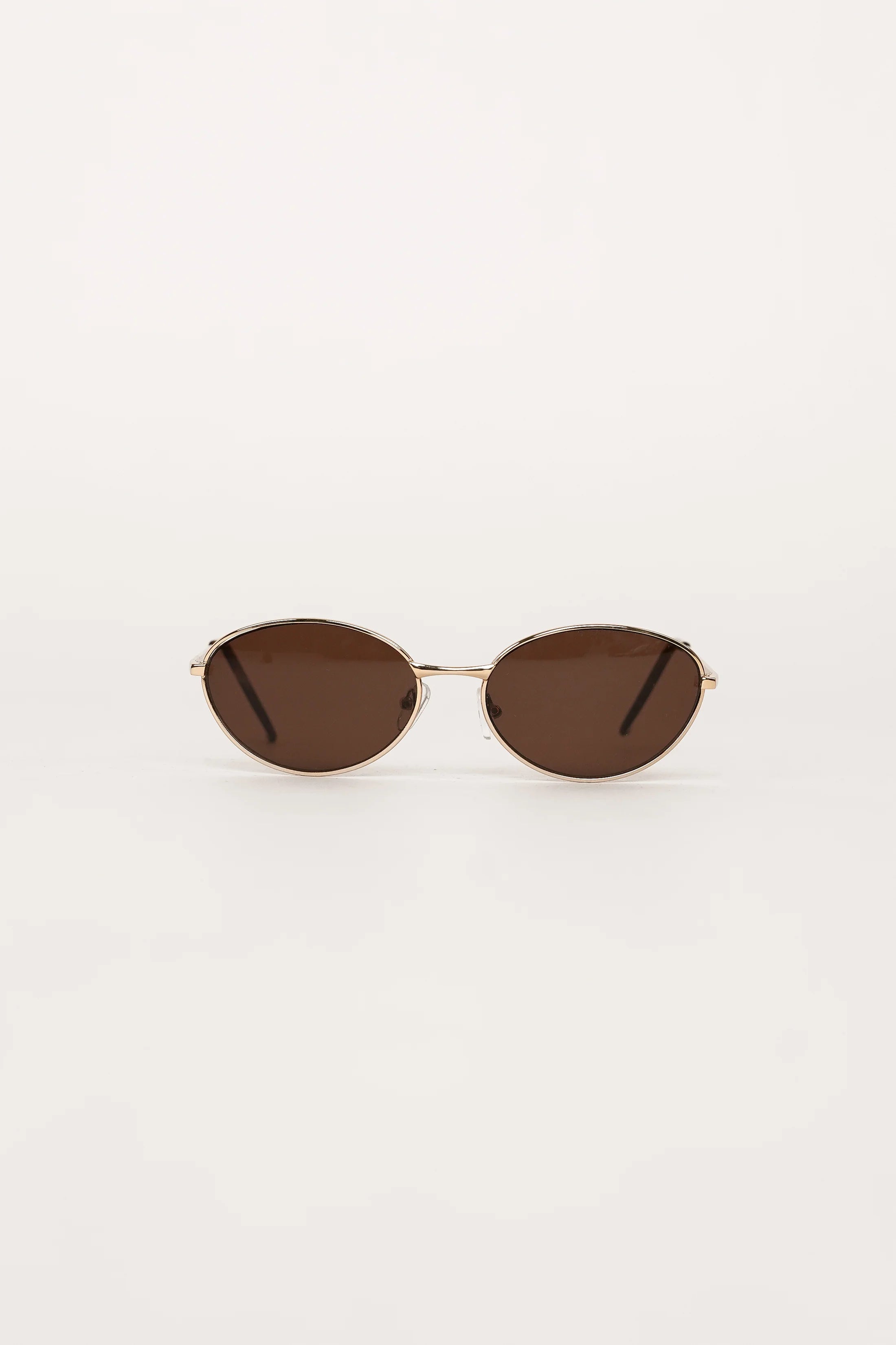 Slim Oval Brown Sunglasses – UV Protection